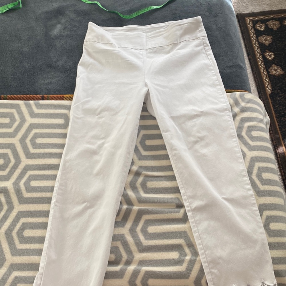 White, 10 P ankle length. Made with ration, nylon and spandex.